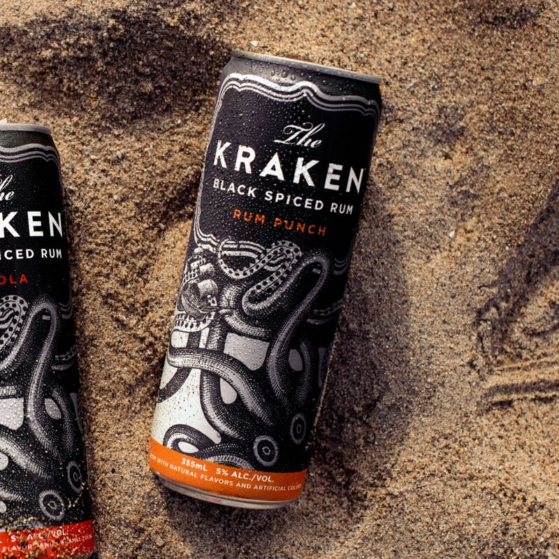 The Kraken Black Spiced Rum & Cola Canned Cocktails on ice